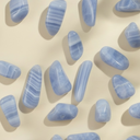 Blue lace agate stones on a beige background