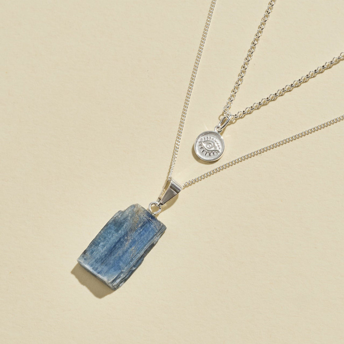 Awaken symbol evil eye necklace