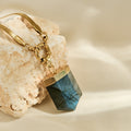 Labradorite gemstone with gold chain